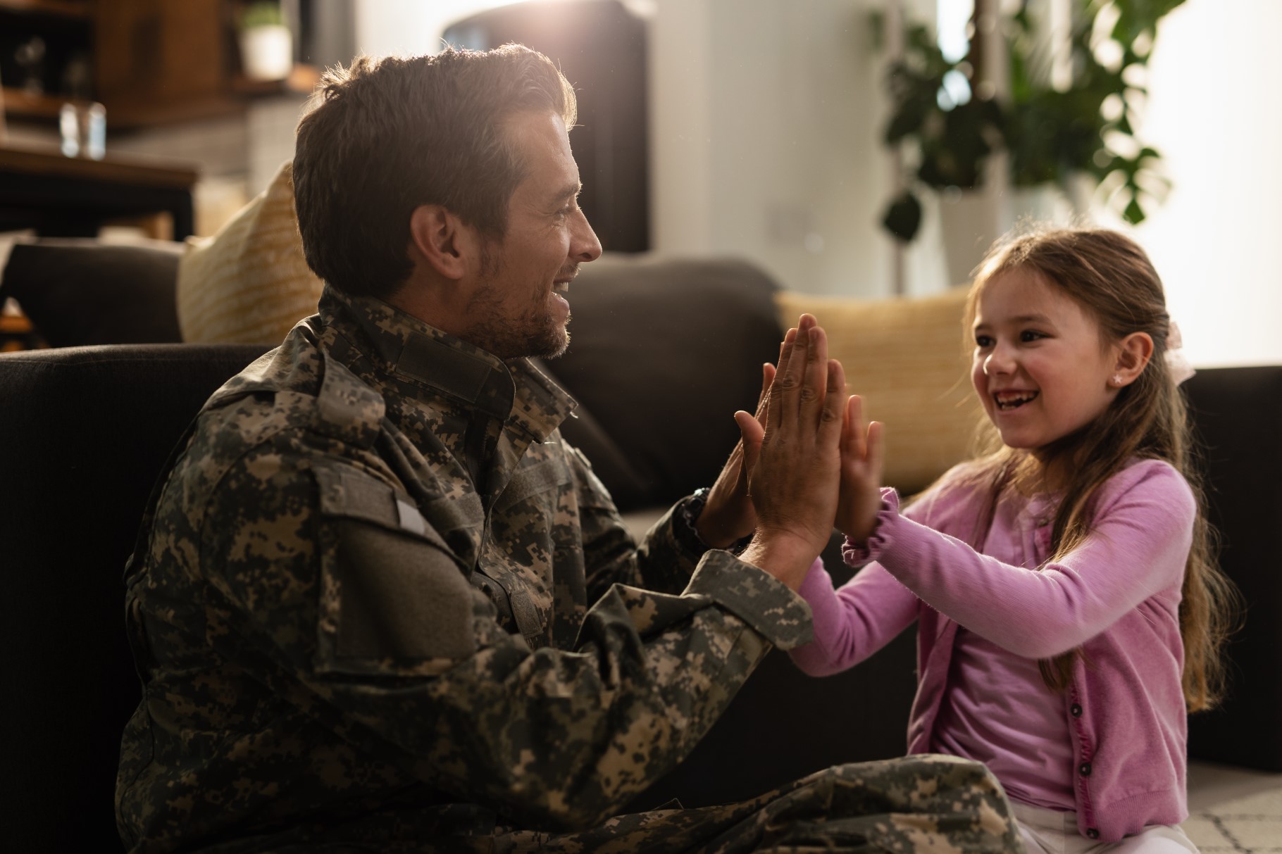 Happy military dad and his daughter